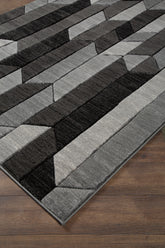 Sectionals for Less - Ashley Furniture - Chayse Rug - 5' x 6'7" Rug / Black/Gray - R403462