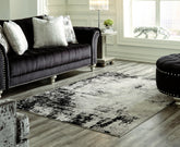 Sectionals for Less - Ashley Furniture - Zekeman Rug - 7'10" x 10' Rug / Black/Cream/Gray - R404921