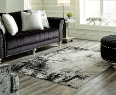 Sectionals for Less - Ashley Furniture - Zekeman Rug - 7'10" x 10' Rug / Black/Cream/Gray - R404921