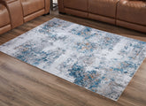 Sectionals for Less - Ashley Furniture - Garyard Rug - 5' x 7' Washable Rug / Multi - R405772