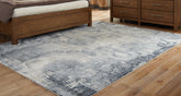 Sectionals for Less - Ashley Furniture - Langrich Rug - 7'10" x 10'6" Rug / Blue/Gray/Cream - R406131