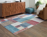 Sectionals for Less - Ashley Furniture - Numore Rug - 5'2" x 6'11" Washable Rug / Multi - R406662