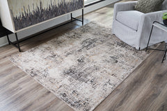 Sectionals for Less - Ashley Furniture - Elaning Rug - 8' x 10' Rug / Black/Gray/Cream - R406701