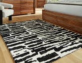 Sectionals for Less - Ashley Furniture - Bramshaw Rug - 5' x 7' Rug / Black/Ivory - R406762