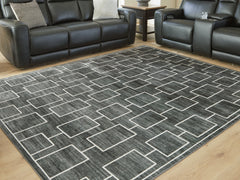 Sectionals for Less - Ashley Furniture - Elderland Rug - Washable 5' x 7' Area Rug / Black/Gray - R407402