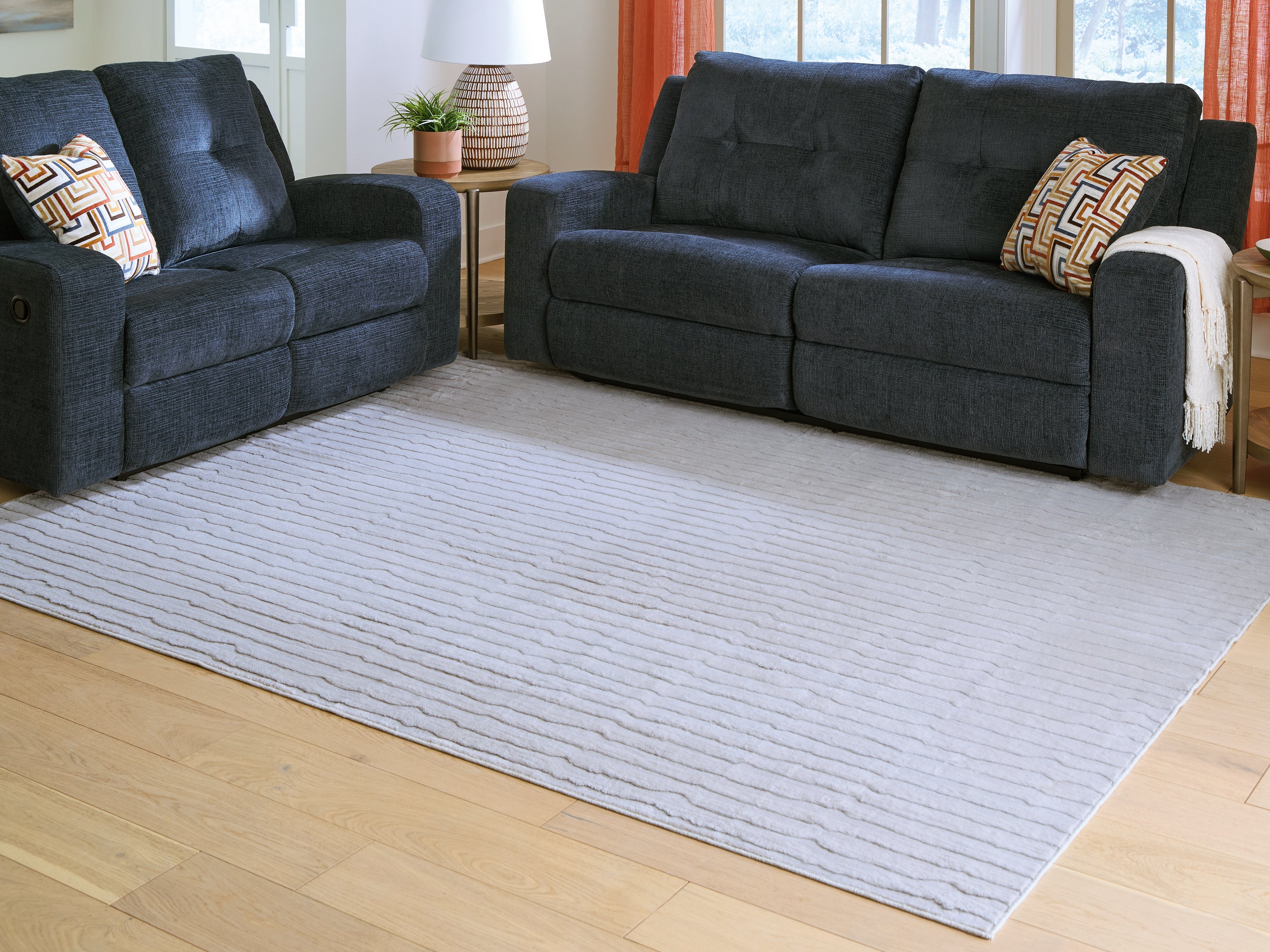 Sectionals for Less - Ashley Furniture - Worthley Rug - Washable 5' x 7' Area Rug / Gray - R407452