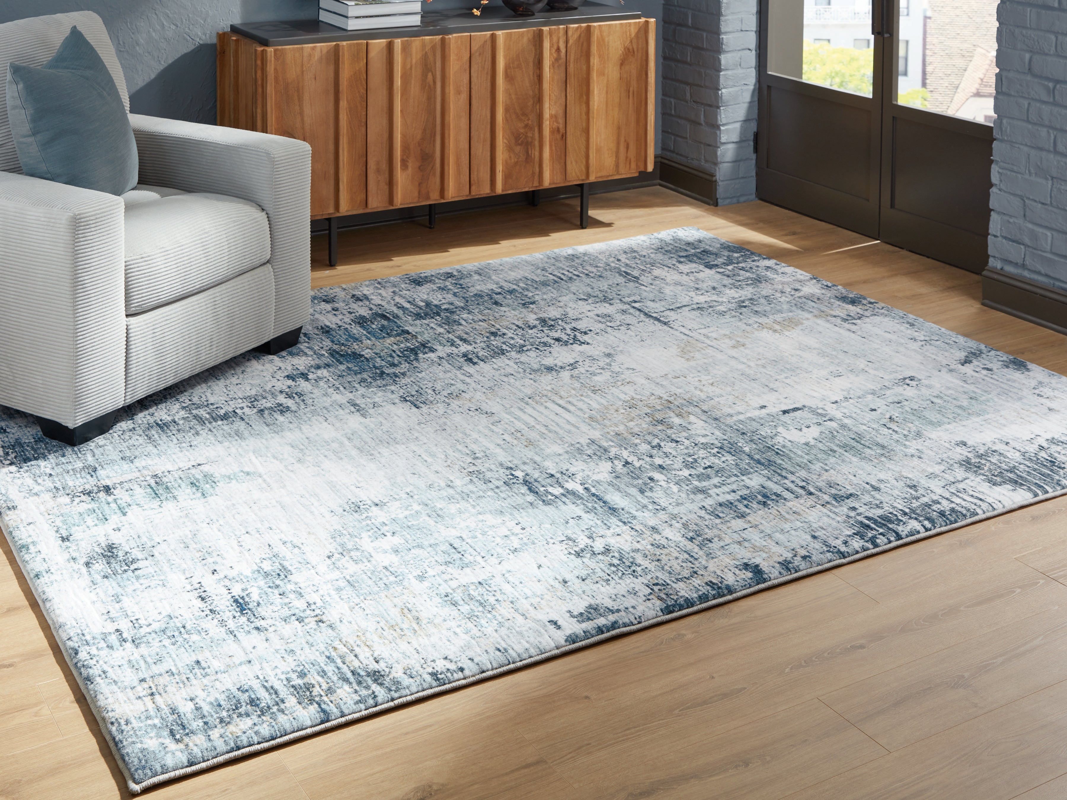 Sectionals for Less - Ashley Furniture - Arlenmont Rug - 5' x 7' Area Rug / Blue/White/Brown - R407482