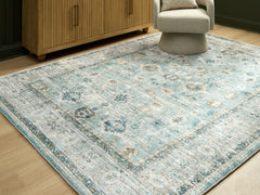 Sectionals for Less - Ashley Furniture - Ladstoney Rug - 5' x 7' Area Rug / Teal/Beige/Ochre - R407502