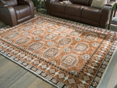 Sectionals for Less - Ashley Furniture - Qaabiz Rug - 5' x 7' Area Rug / Sienna/Ivory/Black - R407522