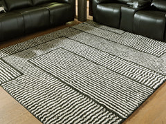 Sectionals for Less - Ashley Furniture - Kurtmen Rug - 5' x 7' Area Rug / Black/Ivory - R407592