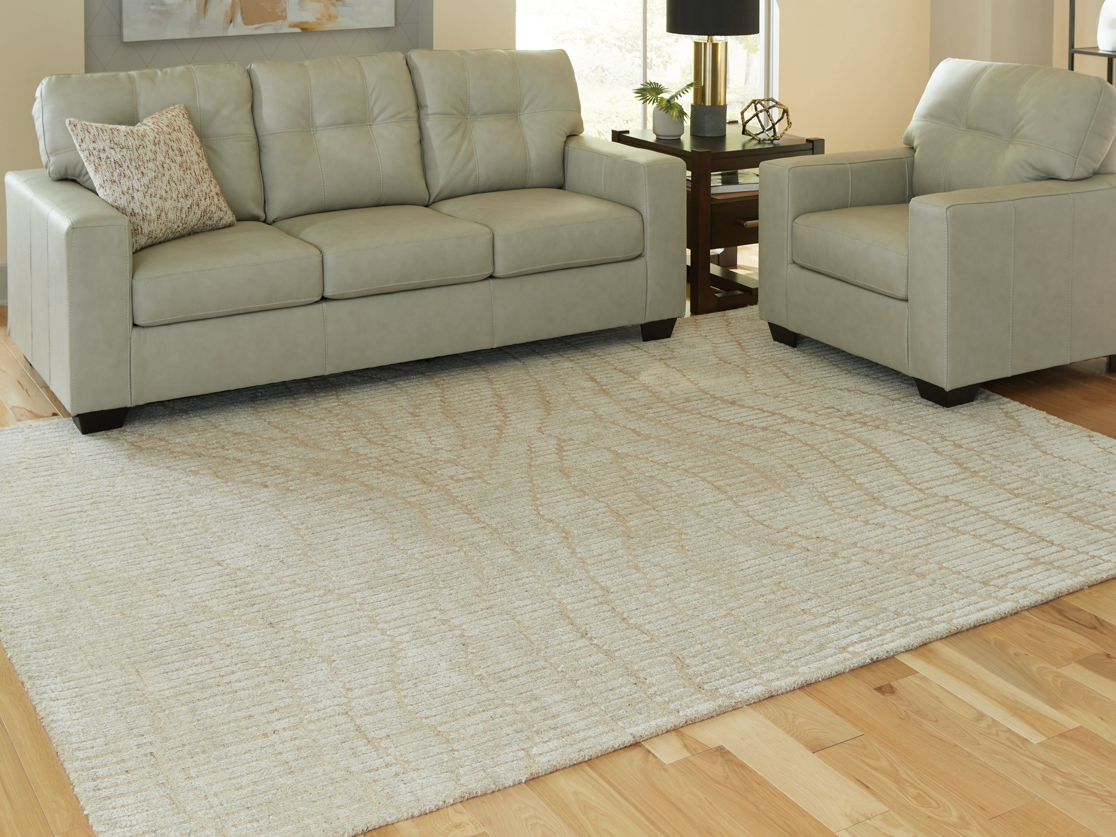 Sectionals for Less - Ashley Furniture - Jaseena Rug - 7'8" x 10' Area Rug / Beige/Tan - R407721