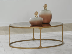 Sectionals for Less - Ashley Furniture - Korajane Coffee Table - Oval Cocktail Table / Antique Gold - T399-0