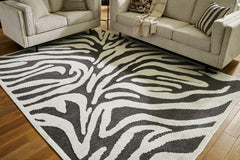 Sectionals for Less - Ashley Furniture - Thomwith Rug - 8' x 10'2" Washable Rug / Black/Ivory - R406291