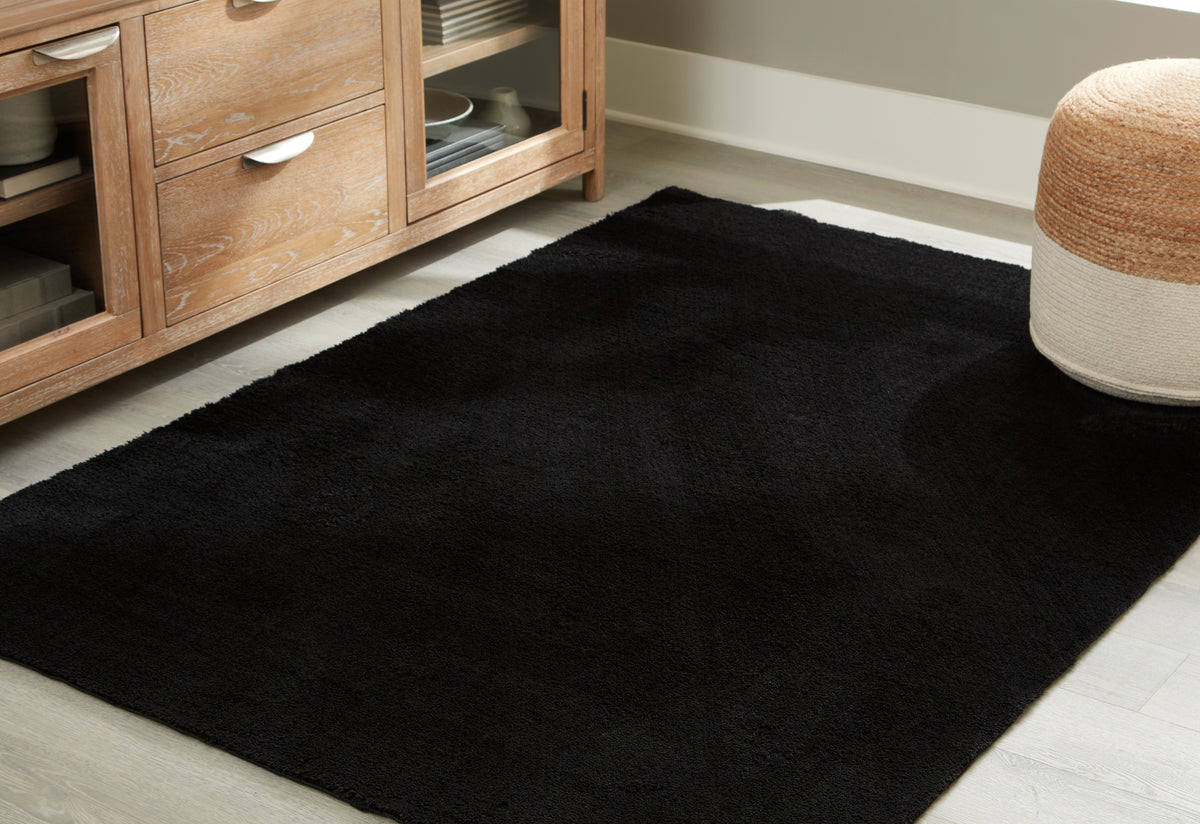Sectionals for Less - Ashley Furniture - Anaben Rug - 5' x 7' Washable Rug / Black - R406312