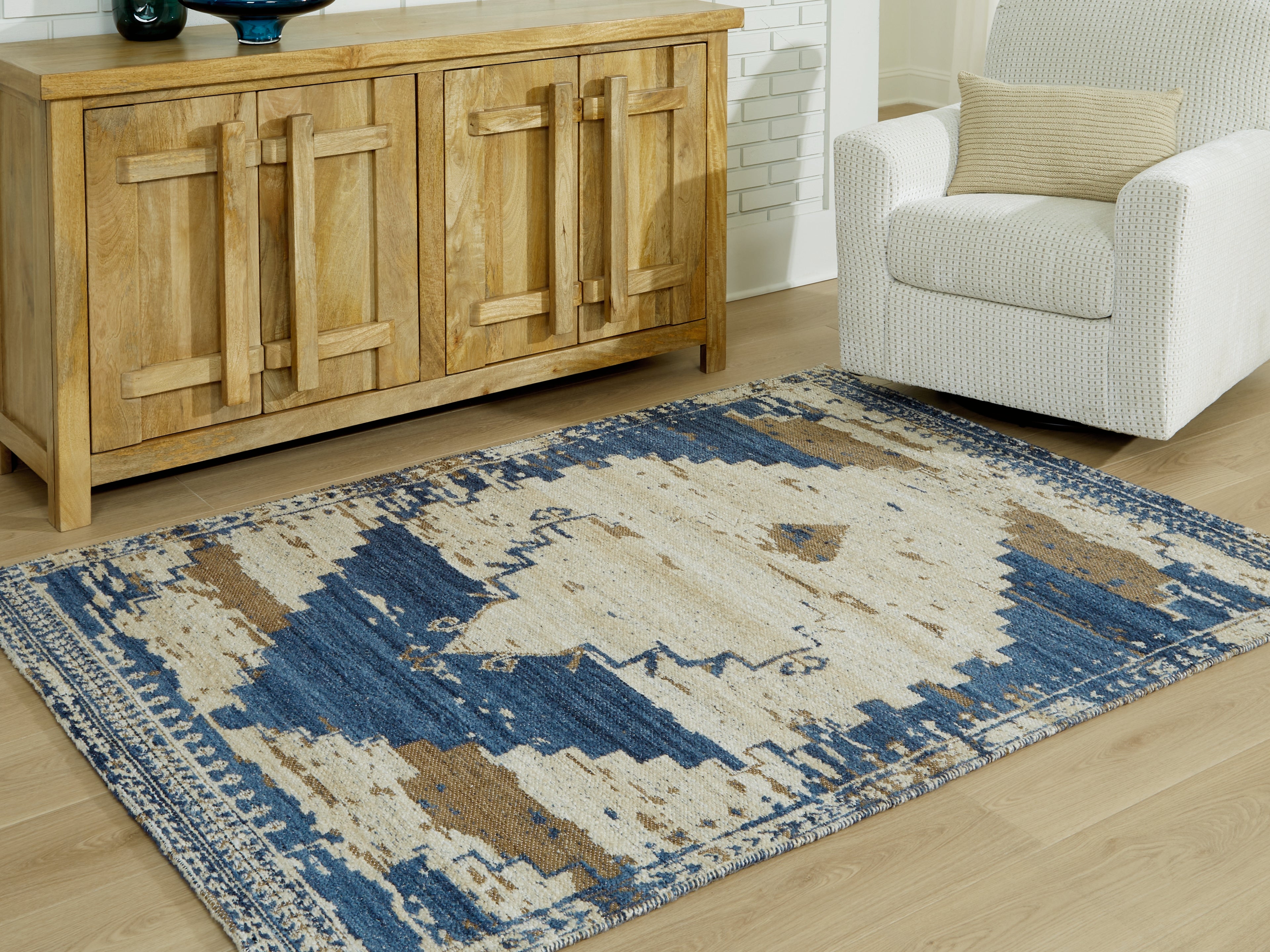 Sectionals for Less - Ashley Furniture - Varnler Rug - 5' x 7' Rug / Blue/Brown/Tan - R407132