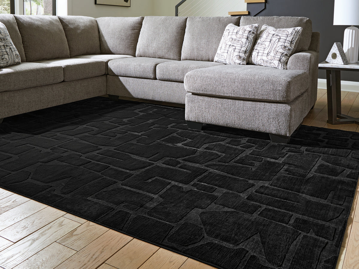 Sectionals for Less - Ashley Furniture - Gibbswell Rug - Washable 8' x 10' Area Rug / Black - R407461