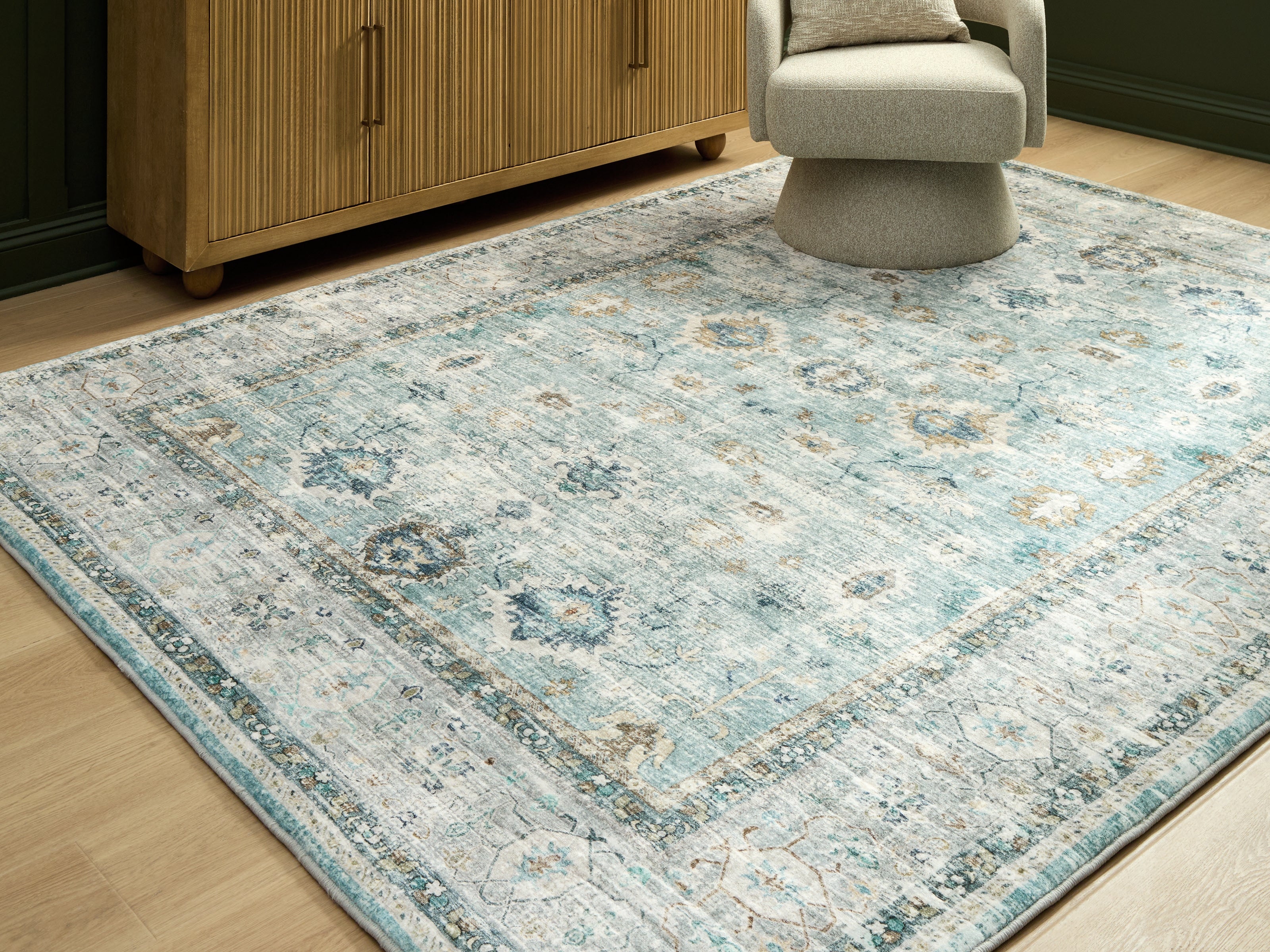 Sectionals for Less - Ashley Furniture - Ladstoney Rug - 5' x 7' Area Rug / Teal/Beige/Ochre - R407502