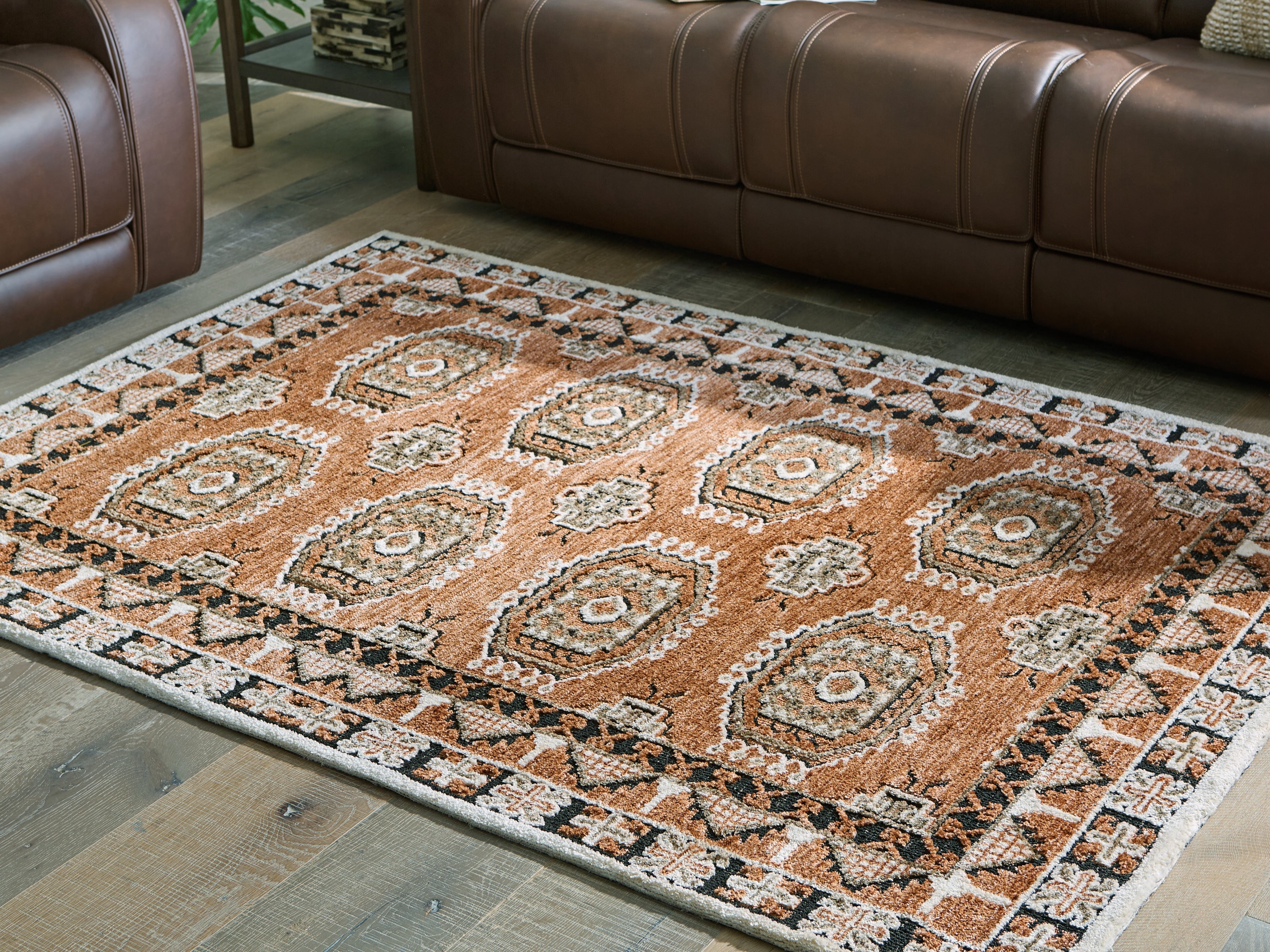 Sectionals for Less - Ashley Furniture - Qaabiz Rug - 5' x 7' Area Rug / Sienna/Ivory/Black - R407522