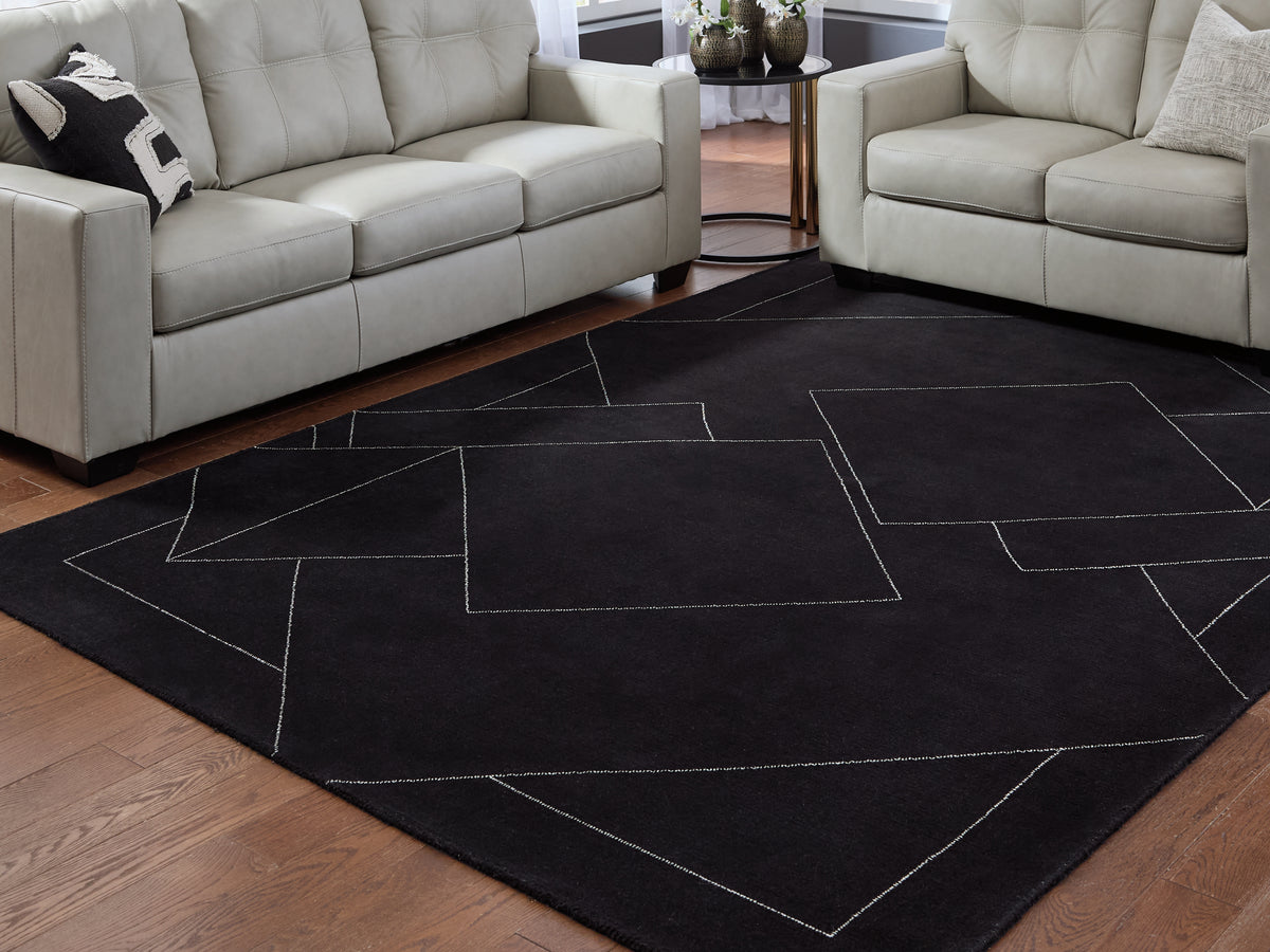 Sectionals for Less - Ashley Furniture - Marav Rug - 7'8" x 10' Area Rug / Black/White - R407531