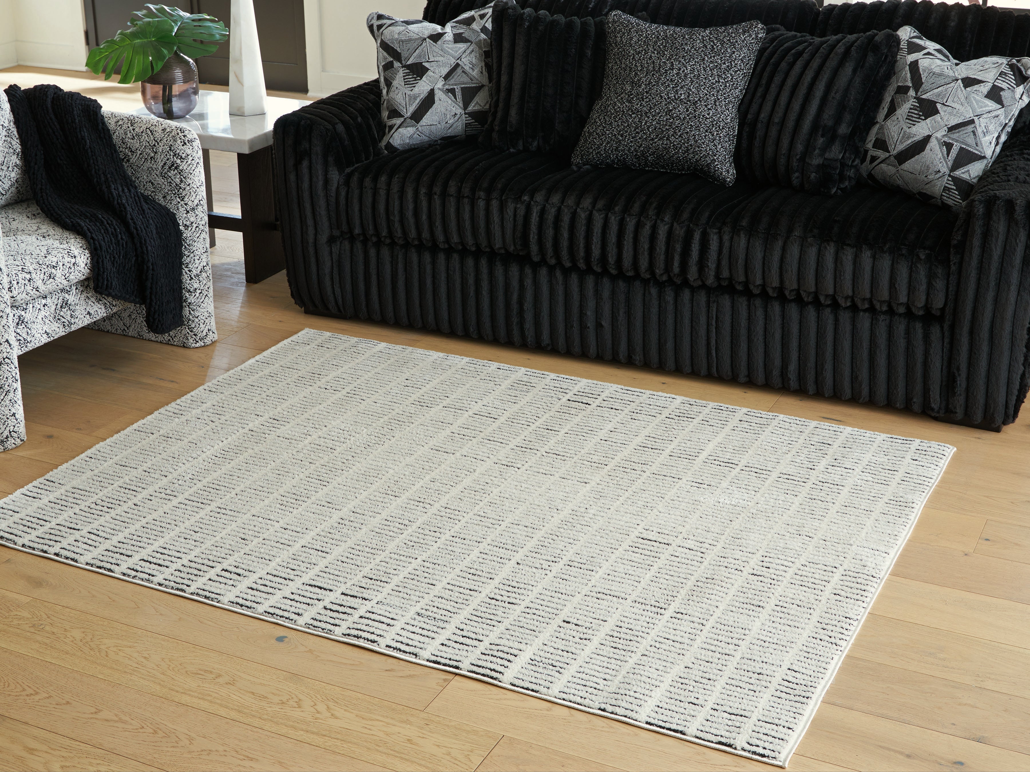 Sectionals for Less - Ashley Furniture - Turinwith Rug - 5'3" x 7' Area Rug / Ivory/Black - R407552