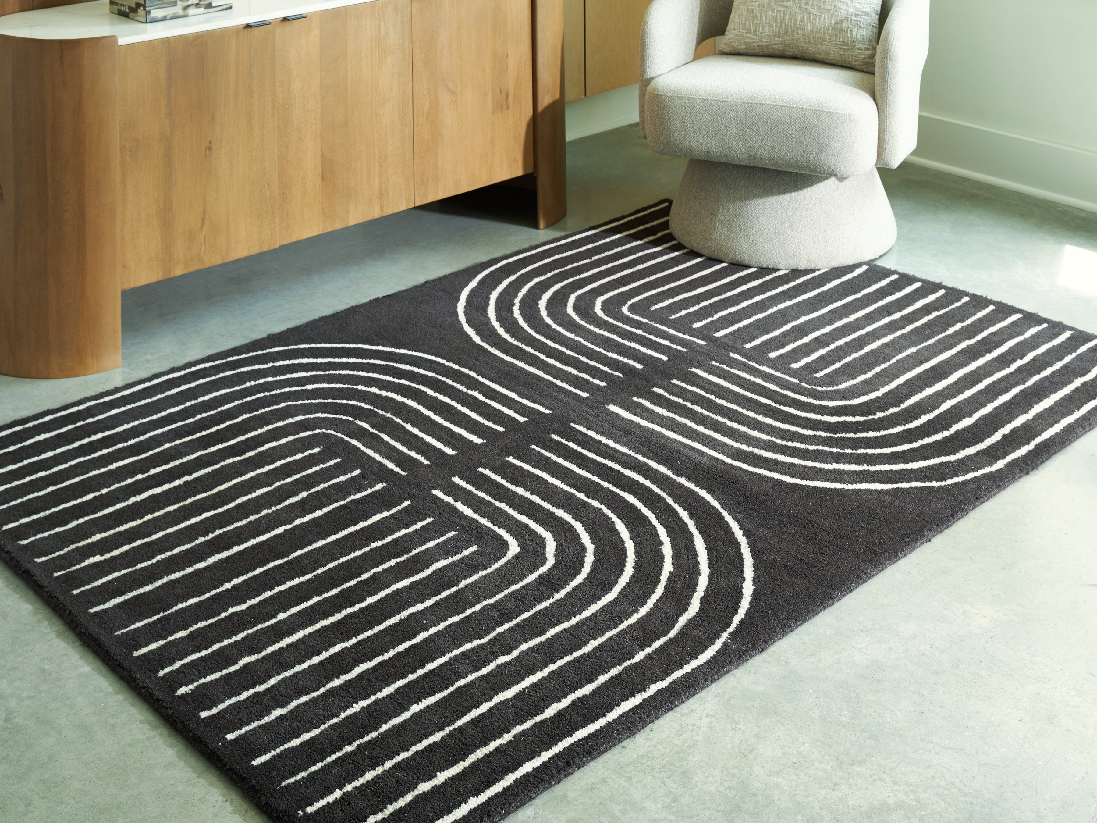 Sectionals for Less - Ashley Furniture - Eldonmore Rug - 5' x 7' Area Rug / Black/Ivory - R407572