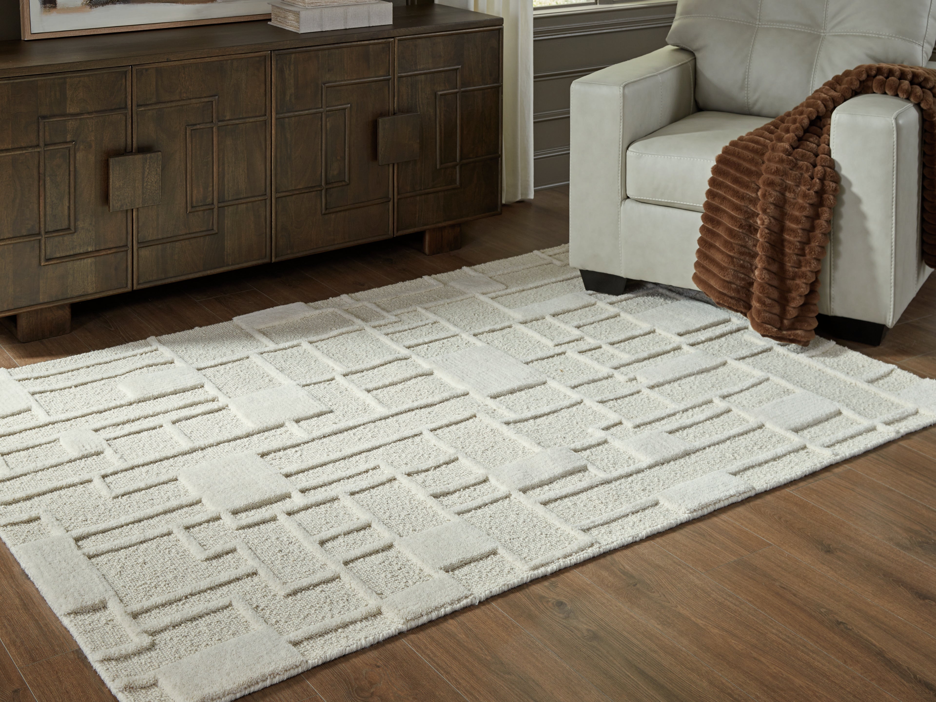 Sectionals for Less - Ashley Furniture - Empriss Rug - 7'8" x 10' Area Rug / Ivory - R407621