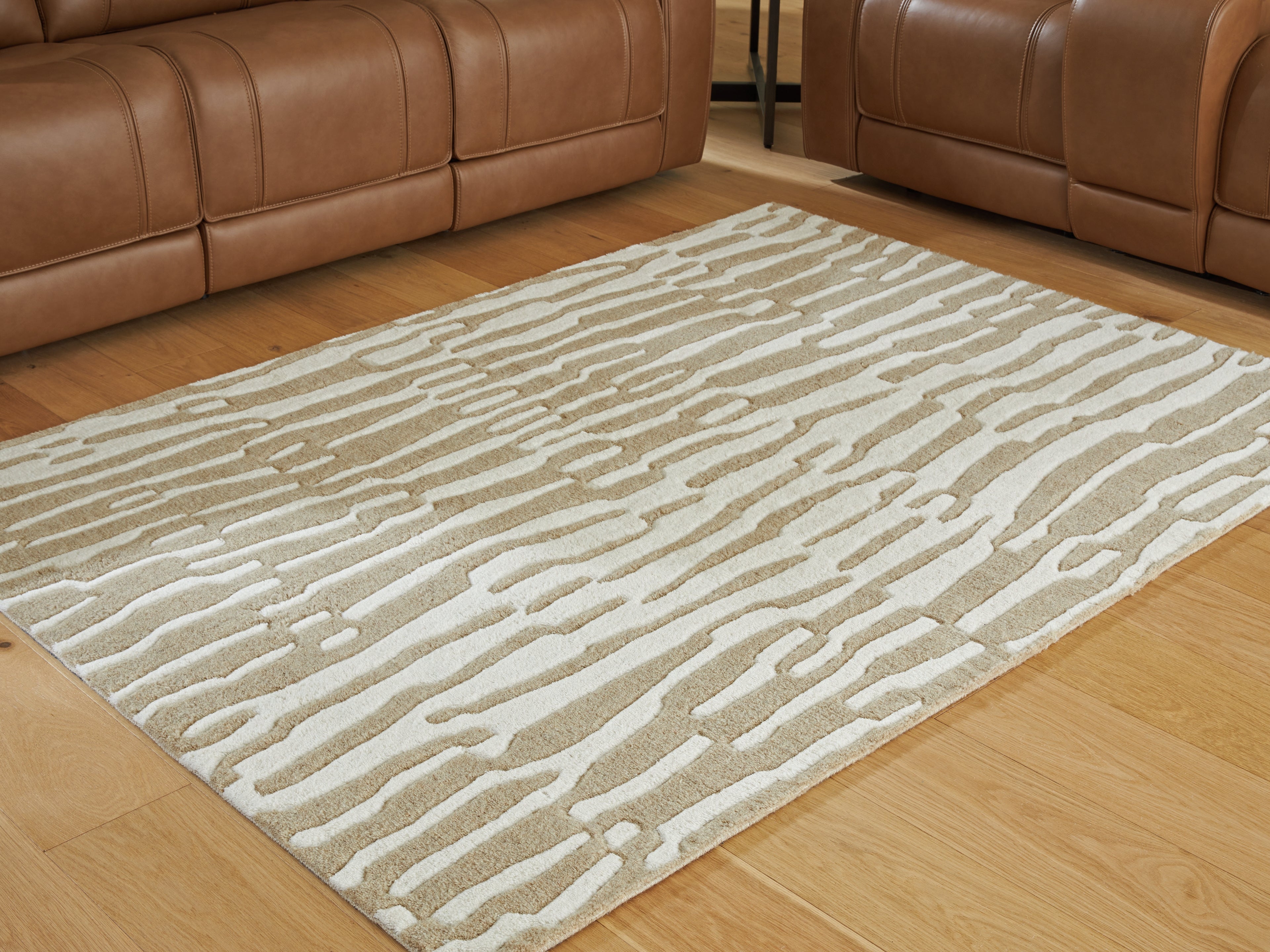 Sectionals for Less - Ashley Furniture - Corrbell Rug - 5' x 7' Area Rug / Beige/White - R407632