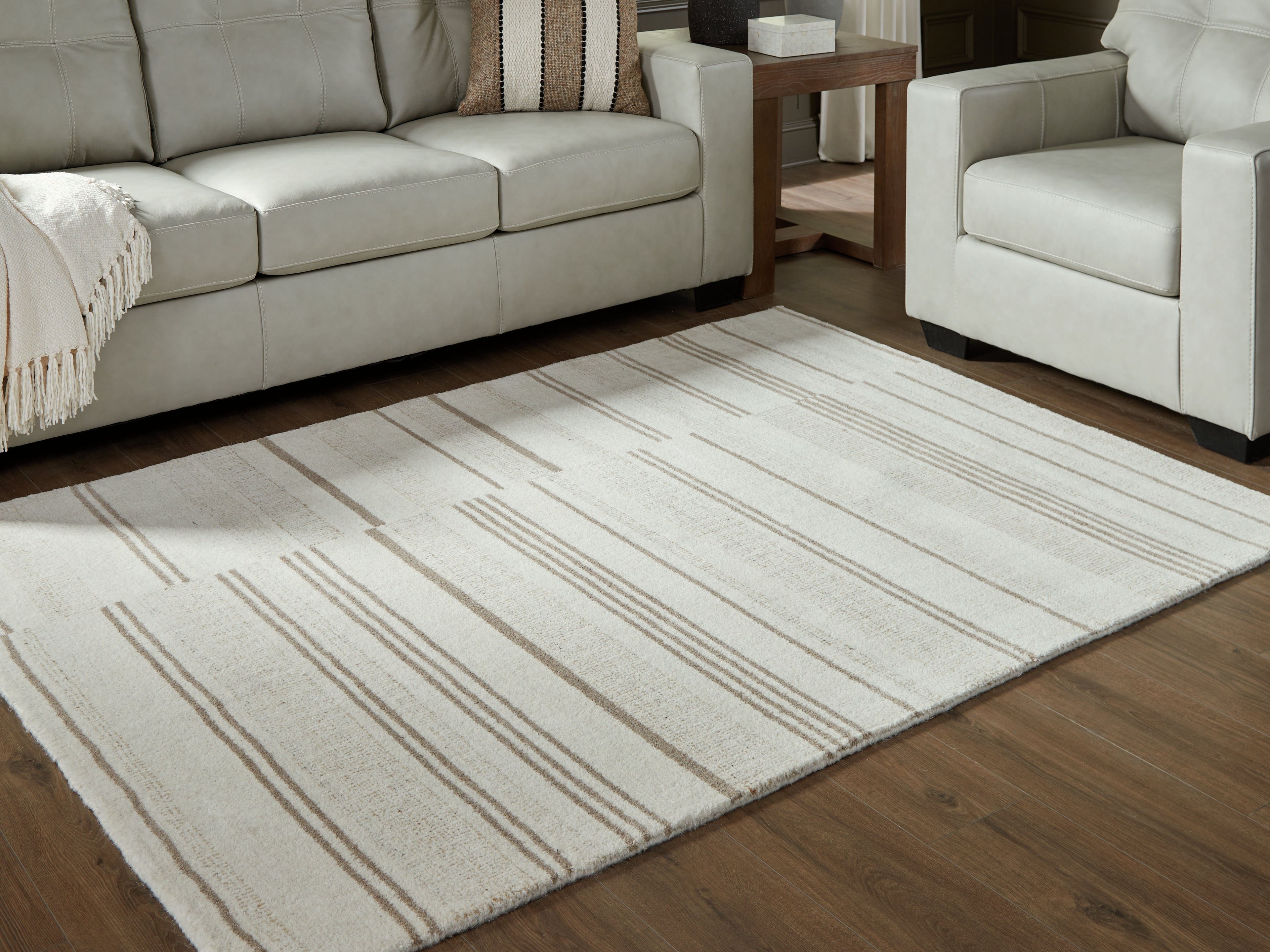 Sectionals for Less - Ashley Furniture - Gadence Rug - 5' x 7' Area Rug / Ivory/Tan - R407642