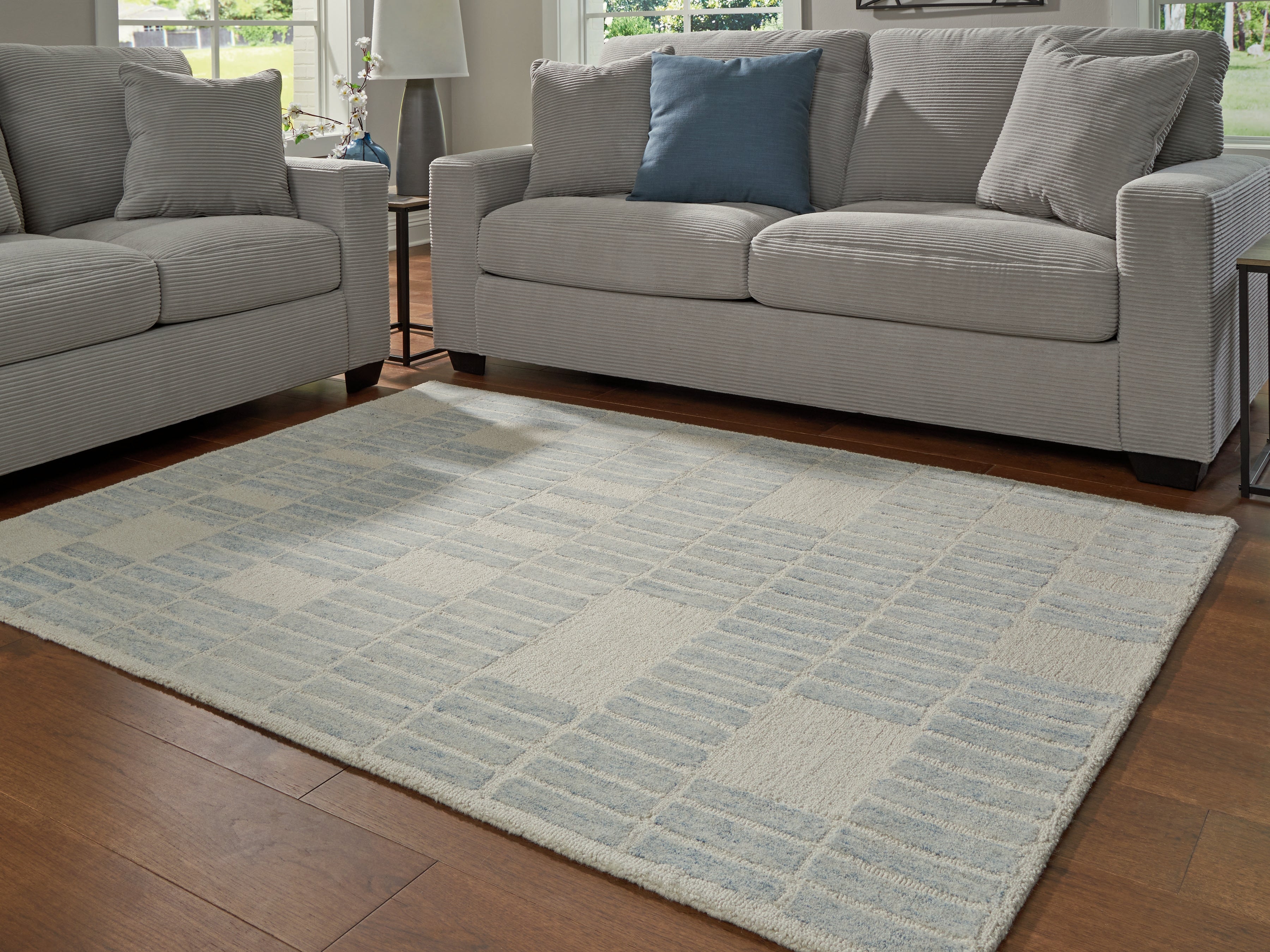 Sectionals for Less - Ashley Furniture - Dylanton Rug - 5' x 7' Area Rug / Ivory/Blue - R407812
