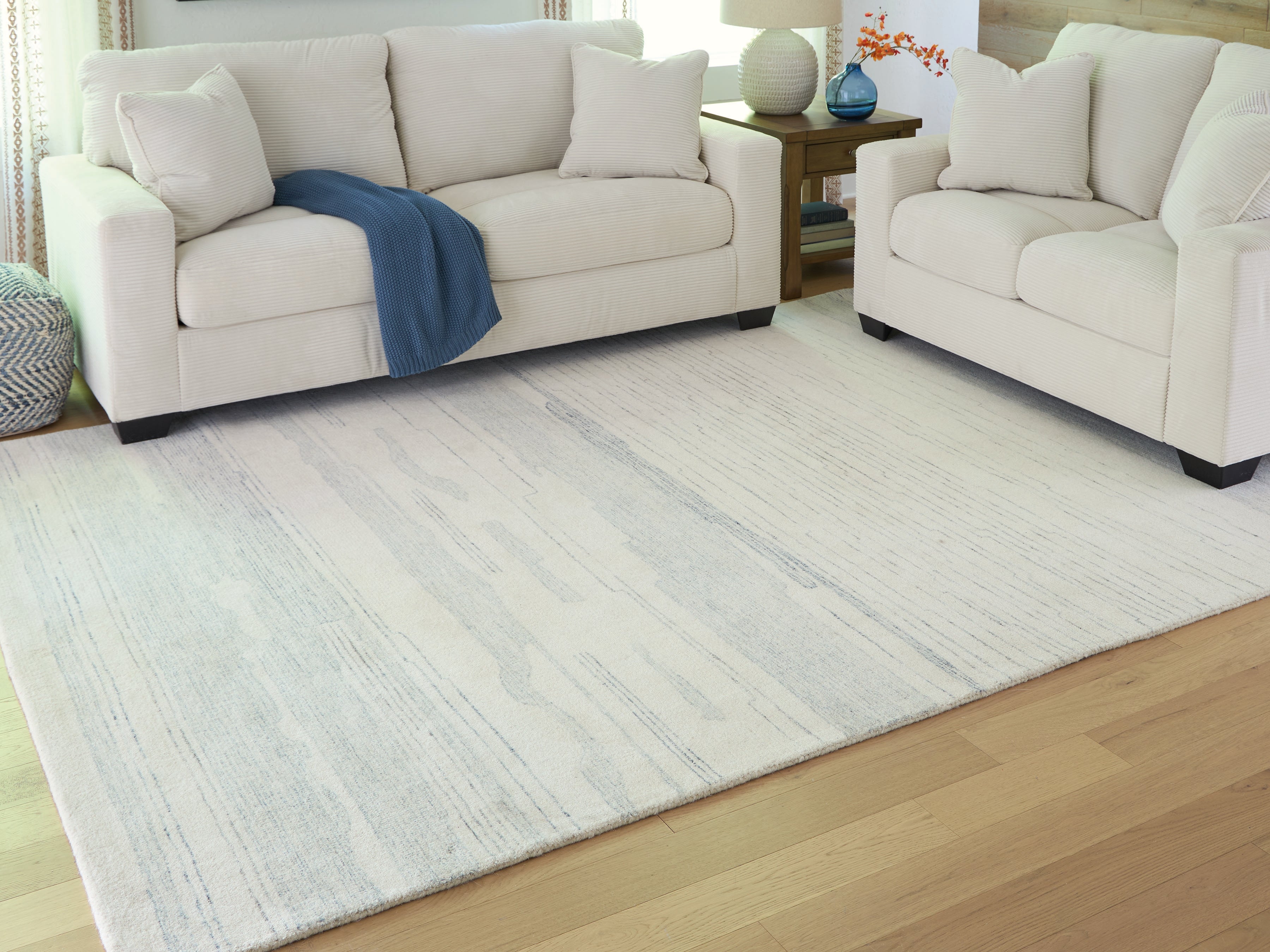 Sectionals for Less - Ashley Furniture - Genemost Rug - 5' x 7' Area Rug / Ivory/Blue - R407842