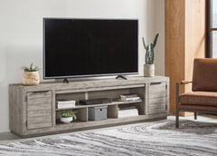 Sectionals for Less - Ashley Furniture - Naydell 92" TV Stand - 92" / Gray - W996-78